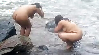 two indian mature womens bathing in river naked