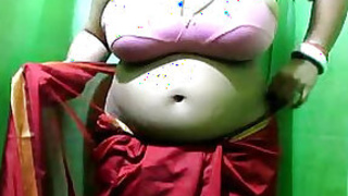 Aunt Booby with huge melons wearing sari showing her huge cleavage and big belly button