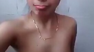 Desi girl showing her cute boobs on selfie cam in bathroom