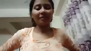 Attractive Indian takes off dress even though the boyfriend films her