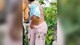 Assamese Desi wife with her husband in the open air MMS