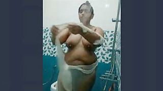 A horny Mallu Bhabhi Bathes and dances nude Part 2