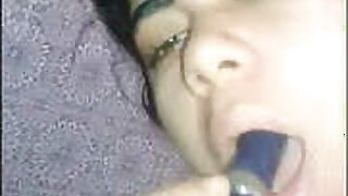 Desi Auntie's putting her lipstick in