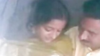 A South Indian sex film scene of a desi warmer fooling around with her lover