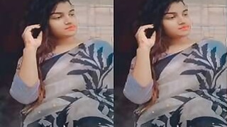 A horny Indian woman shows off her tits and wet pussy.